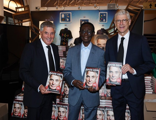 Ambassador Ray Quarcoo, flanked by David Dein (left) and Arsene Wenger (right) at the book launch in London last week 	